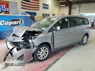 2015 Mazda 5 Sport z VIN JM1CW2BL3F0181621, wystawiony jako Copart lot #57063715 z przebiegiem 95 104 mil mil oraz Szkoda całkowita • Salvage title. Historia ofert i sprzedaży dostępna na DreamBid. Obrazek 1.