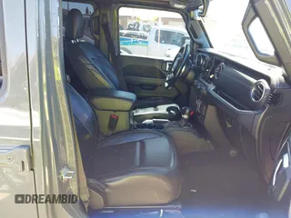 2020 Jeep Gladiator Overland z VIN 1C6HJTFG4LL143369, wystawiony jako IAAI lot #41827409 z przebiegiem 77 752 mil mil oraz . Historia ofert i sprzedaży dostępna na DreamBid. Obrazek 5.