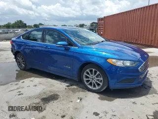 2017 Ford Fusion Hybrid SE z VIN 3FA6P0LU6HR319103, wystawiony jako Copart lot #58494695 z przebiegiem 104 483 mil mil oraz Szkoda całkowita • Salvage title. Historia ofert i sprzedaży dostępna na DreamBid. Obrazek 4.