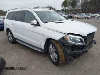 2014 Mercedes-Benz GL 450 z VIN 4JGDF7CE5EA390994, wystawiony jako IAAI lot #41618791 z przebiegiem 130 492 mil mil oraz . Historia ofert i sprzedaży dostępna na DreamBid. Obrazek 1.