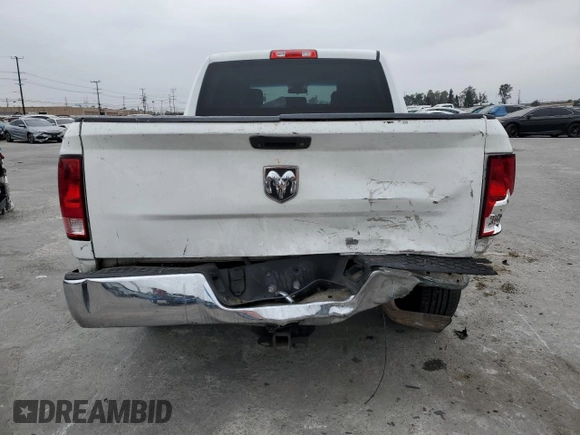 2018 Ram 1500 Tradesman z VIN 3C6RR6KT6JG219170, wystawiony jako Copart lot #54203595 z przebiegiem 153 322 mil mil oraz Szkoda całkowita • Salvage title. Historia ofert i sprzedaży dostępna na DreamBid. Obrazek 6.