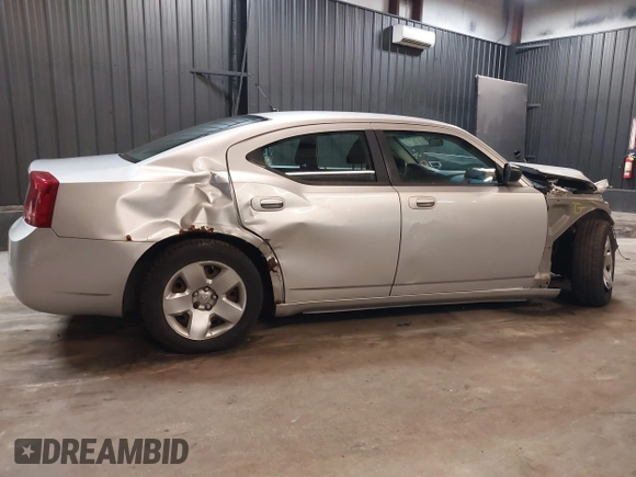 2008 Dodge Charger z VIN 2B3KA43RX8H326355, wystawiony jako IAAI lot #42310534 z przebiegiem 103 342 mil mil oraz . Historia ofert i sprzedaży dostępna na DreamBid. Obrazek 14.