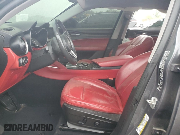 2018 Alfa Romeo Stelvio z VIN ZASFAKAN7J7B72474, wystawiony jako Copart lot #58086545 z przebiegiem Nie podano mil oraz Czysty tytuł • Clean title. Historia ofert i sprzedaży dostępna na DreamBid. Obrazek 7.