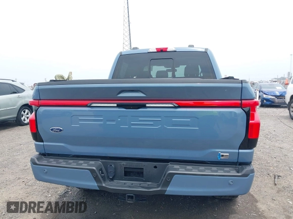 2023 Ford F-150 Lightning Pro with VIN 1FT6W1EVXPWG53591, listed as a IAAI auction lot 42249385 with 17,892 mi miles and . Bid and sale history available at DreamBid. Image 16.