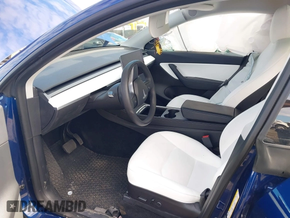 2022 Tesla Model Y Long Range with VIN 7SAYGDEE6NF318372, listed as a IAAI auction lot 41526857 with 26,083 mi miles and . Bid and sale history available at carsss.com. Image 5.