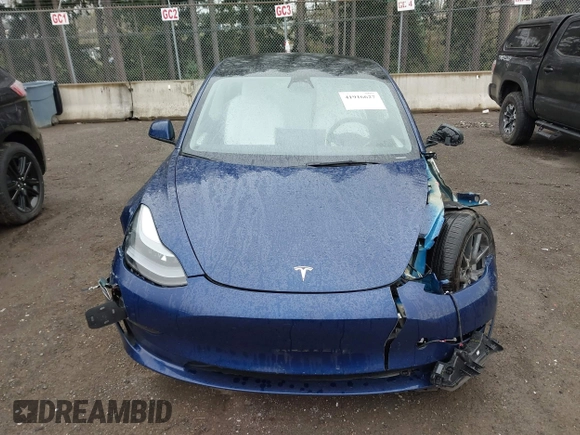 2023 Tesla Model 3 Long Range with VIN 5YJ3E1EB5PF704463, listed as a IAAI auction lot 41916627 with 14,305 mi miles and . Bid and sale history available at DreamBid. Image 12.
