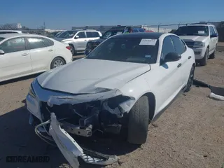 2018 Alfa Romeo Giulia Ti Sport with VIN ZARFAEEN9J7572787, listed as a IAAI auction lot 41646814 with 56,094 mi miles. Bid and sale history available at carsss.com. Image 2.