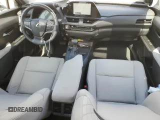 2024 Lexus UX with VIN JTHX6JBHXR2168962, listed as a Copart auction lot 51153075 with 7,080 mi miles and Salvage Title. Bid and sale history available at carsss.com. Image 8.