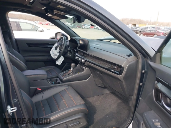 2025 Honda CR-V Sport Touring with VIN 5J6RS6H92SL004294, listed as a IAAI auction lot 41705883 with 23,397 mi miles and . Bid and sale history available at DreamBid. Image 5.