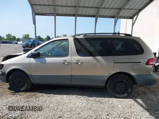 2002 Toyota Sienna LE with VIN 4T3ZF13C82U465335, listed as a IAAI auction lot 40274809 with 178,560 mi miles and . Bid and sale history available at DreamBid. Image 14.