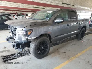 2018 Nissan Titan SV with VIN 1N6AA1E57JN515817, listed as a Copart auction lot 65537205 with 69,567 mi miles and Salvage title. Bid and sale history available at DreamBid. Image 1.
