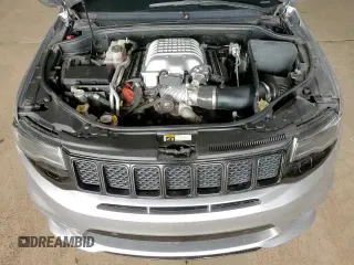 2018 Jeep Grand Cherokee Trackhawk z VIN 1C4RJFN98JC408289, wystawiony jako Copart lot #71044265 z przebiegiem 54 062 mil mil oraz Szkoda całkowita • Salvage title. Historia ofert i sprzedaży dostępna na DreamBid. Obrazek 13.