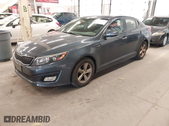 2015 Kia Optima LX with VIN 5XXGM4A76FG381155, listed as a IAAI auction lot 42373920 with 112,359 mi miles and . Bid and sale history available at DreamBid. Image 2.