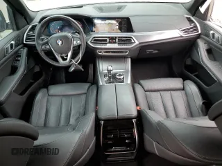 2022 BMW X5 xDrive40i with VIN 5UXCR6C01N9M26766, listed as a Copart auction lot 50990865 with 24,036 mi miles and Salvage Title. Bid and sale history available at DreamBid. Image 8.