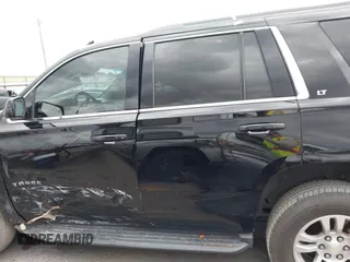 2016 Chevrolet Tahoe LT with VIN 1GNSCBKC1GR137030, listed as a IAAI auction lot 42180664 with 169,493 mi miles and . Bid and sale history available at DreamBid. Image 14.
