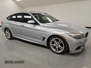 2015 BMW 3 Series 328i Gran Turismo xDrive with VIN WBA3X5C53FD562373, listed as a Copart auction lot 54012235 with 133,869 mi miles and Clean title. Bid and sale history available at DreamBid. Image 4.
