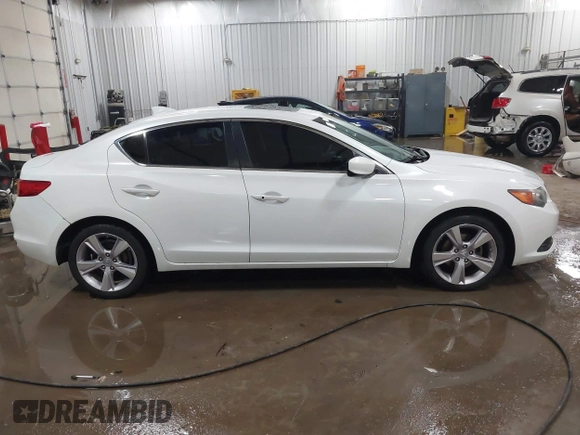2014 Acura ILX z VIN 19VDE1F35EE006166, wystawiony jako IAAI lot #41320730 z przebiegiem 203 151 mil mil oraz . Historia ofert i sprzedaży dostępna na DreamBid. Obrazek 13.