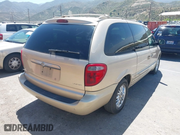2001 Chrysler Town & Country Limited with VIN 2C8GP64L31R241168, listed as a IAAI auction lot 42094315 with 213,800 mi miles. Bid and sale history available at carsss.com. Image 4.