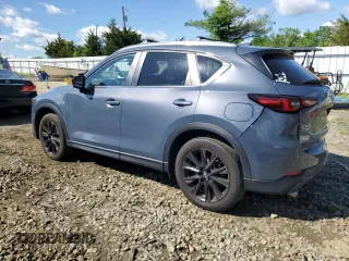 2023 Mazda CX-5 S Carbon Edition z VIN JM3KFBCM9P0110080, wystawiony jako Copart lot #55911635 z przebiegiem 20 835 mil mil oraz Szkoda całkowita • Salvage title. Historia ofert i sprzedaży dostępna na DreamBid. Obrazek 2.