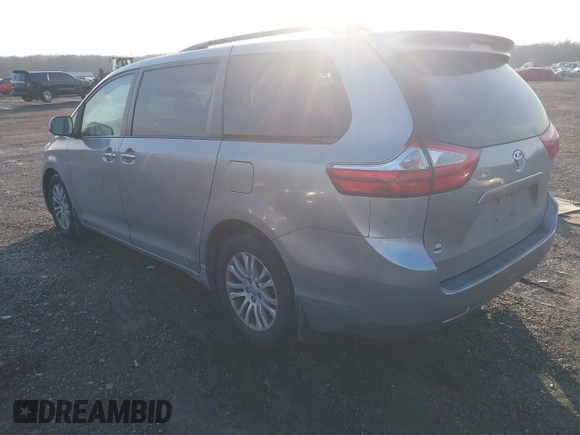 2016 Toyota Sienna XLE with VIN 5TDYK3DC2GS720782, listed as a IAAI auction lot 41184141 with 146,656 mi miles. Bid and sale history available at carsss.com. Image 3.