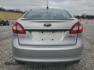 2012 Ford Fiesta SE with VIN 3FADP4BJ5CM170288, listed as a Copart auction lot 49471605 with 104,851 mi miles and Salvage Title. Bid and sale history available at DreamBid. Image 6.