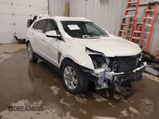 2016 Cadillac SRX Luxury Collection with VIN 3GYFNEE34GS582435, listed as a IAAI auction lot 41325240 with 164,162 mi miles. Bid and sale history available at carsss.com. Image 1.