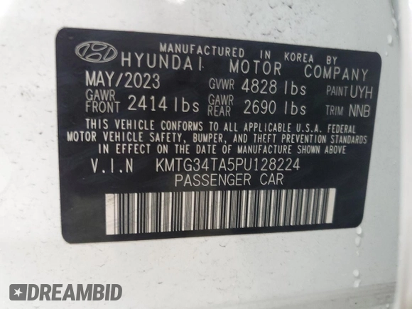 2023 Genesis G70 2.0T with VIN KMTG34TA5PU128224, listed as a Copart auction lot 82026383 with 7,311 mi miles and Salvage Title. Bid and sale history available at DreamBid. Image 12.