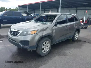 2013 Kia Sorento LX with VIN 5XYKT3A1XDG381218, listed as a IAAI auction lot 42511747 with 130,253 mi miles and . Bid and sale history available at DreamBid. Image 2.