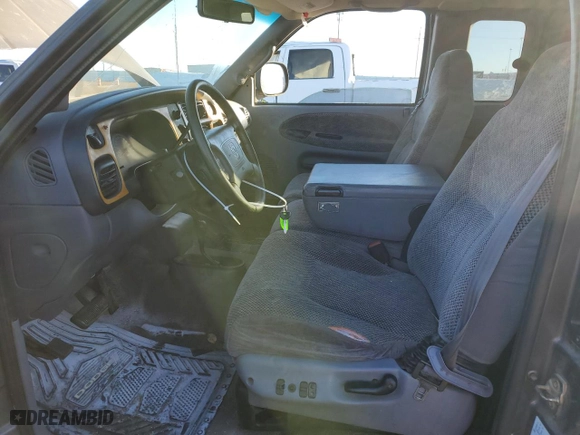 1999 Dodge Ram 1500 with VIN 3B7HF13Z4XG160048, listed as a Copart auction lot 84405374 with 237,247 mi miles and Salvage Title. Bid and sale history available at carsss.com. Image 7.