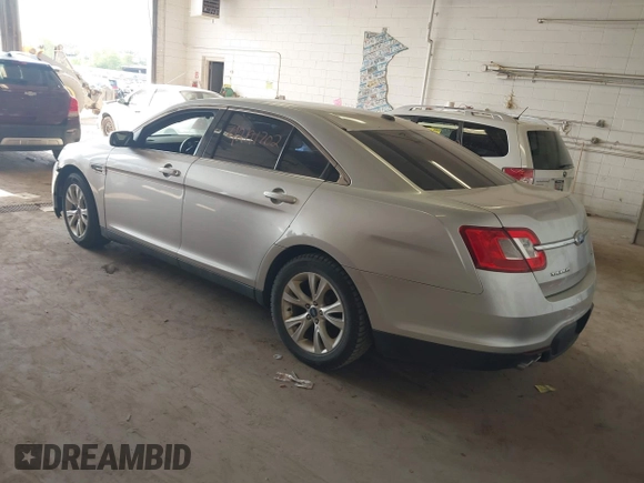 2011 Ford Taurus SEL with VIN 1FAHP2EW6BG170287, listed as a IAAI auction lot 42191702 with 199,477 mi miles. Bid and sale history available at carsss.com. Image 3.