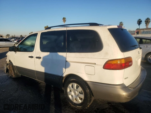 2000 Toyota Sienna LE with VIN 4T3ZF13CXYU184839, listed as a Copart auction lot 80035434 with 0 mi miles and Salvage Title. Bid and sale history available at carsss.com. Image 2.