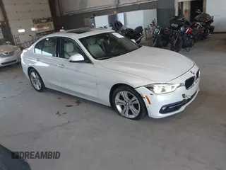 2017 BMW 3 Series 330i with VIN WBA8B9C57HK675592, listed as a IAAI auction lot 40111490 with 142,203 mi miles. Bid and sale history available at carsss.com. Image 1.