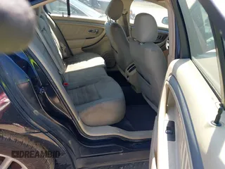 2014 Ford Taurus SE z VIN 1FAHP2D84EG162910, wystawiony jako IAAI lot #41779137 z przebiegiem Nie podano mil oraz . Historia ofert i sprzedaży dostępna na DreamBid. Obrazek 8.