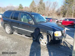 2004 GMC Envoy SLE with VIN 1GKDT13S742248322, listed as a IAAI auction lot 41275622 with 84,784 mi miles. Bid and sale history available at carsss.com. Image 1.
