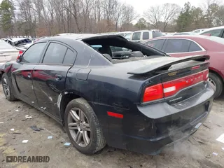 2011 Dodge Charger RT Plus with VIN 2B3CL5CT7BH521577, listed as a IAAI auction lot 41388986 with 135,009 mi miles. Bid and sale history available at carsss.com. Image 3.