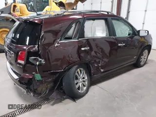 2013 Kia Sorento SX with VIN 5XYKWDA2XDG381984, listed as a IAAI auction lot 41169315 with 144,010 mi miles. Bid and sale history available at carsss.com. Image 4.