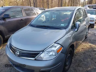 2011 Nissan Versa 1.8 S with VIN 3N1BC1AP9BL423170, listed as a IAAI auction lot 41821121 with 246,940 mi miles. Bid and sale history available at carsss.com. Image 2.