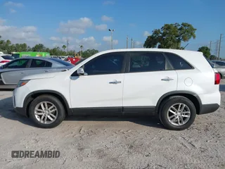 2015 Kia Sorento LX with VIN 5XYKT3A69FG575172, listed as a IAAI auction lot 42151412 with 161,823 mi miles and . Bid and sale history available at carsss.com. Image 14.