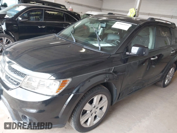 2012 Dodge Journey Crew with VIN 3C4PDCDG7CT183027, listed as a IAAI auction lot 41966923 with 153,576 mi miles and . Bid and sale history available at DreamBid. Image 2.