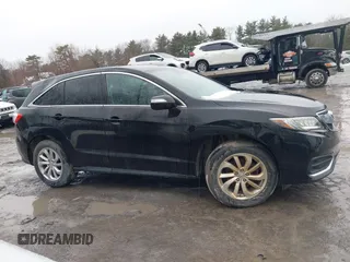 2016 Acura RDX with VIN 5J8TB4H38GL015305, listed as a IAAI auction lot 41672385 with 121,623 mi miles. Bid and sale history available at carsss.com. Image 13.