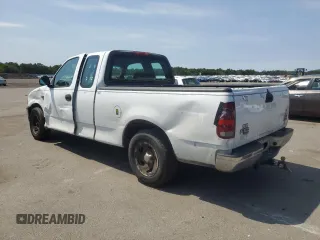 2004 Ford F-150 XL with VIN 2FTRX17W54CA63466, listed as a Copart auction lot 64022895 with 329,377 mi miles and Salvage title. Bid and sale history available at DreamBid. Image 2.