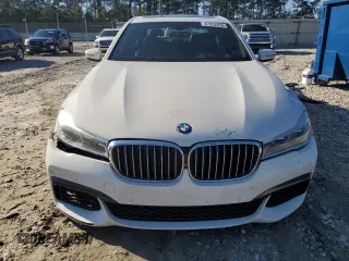 2016 BMW 7 Series 750i with VIN WBA7F0C56GGL99161, listed as a Copart auction lot 87652655 with 97,805 mi miles and Salvage Title. Bid and sale history available at carsss.com. Image 5.