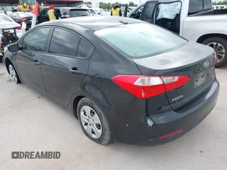 2016 Kia Forte LX with VIN KNAFX4A64G5499881, listed as a IAAI auction lot 42068921 with 122,596 mi miles. Bid and sale history available at carsss.com. Image 3.