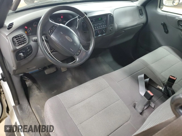 2001 Ford F-150 XL with VIN 1FTRX17L51NB25752, listed as a Copart auction lot 48721235 with 179,941 mi miles and Salvage title. Bid and sale history available at DreamBid. Image 8.