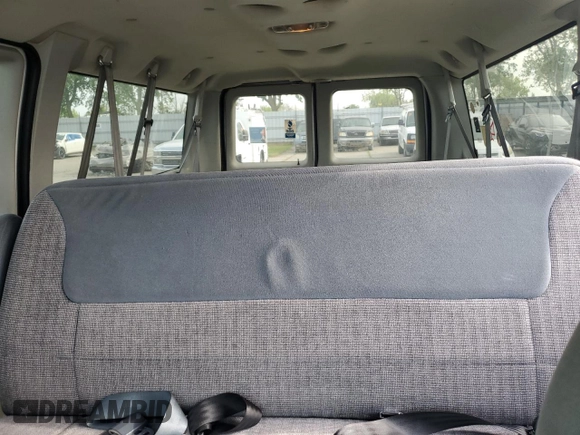 2006 Ford Econoline Passenger XL with VIN 1FBNE31L96HA61105, listed as a Copart auction lot 51996365 with 306,164 mi miles and Salvage title. Bid and sale history available at DreamBid. Image 10.