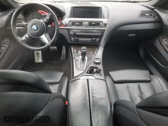 2015 BMW 6 Series 640i xDrive z VIN WBA6B8C5XFD453762, wystawiony jako Copart lot #44228965 z przebiegiem 105 188 mil mil oraz Szkoda całkowita • Salvage title. Historia ofert i sprzedaży dostępna na DreamBid. Obrazek 8.