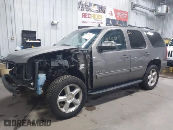 2011 Chevrolet Tahoe LT with VIN 1GNSKBE03BR268246, listed as a IAAI auction lot 41434862 with 250,991 mi miles and . Bid and sale history available at DreamBid. Image 2.