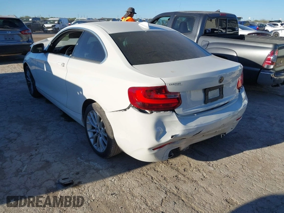2015 BMW 2 Series 228i with VIN WBA1F5C53FV257086, listed as a IAAI auction lot 40898527 with 83,779 mi miles. Bid and sale history available at carsss.com. Image 3.