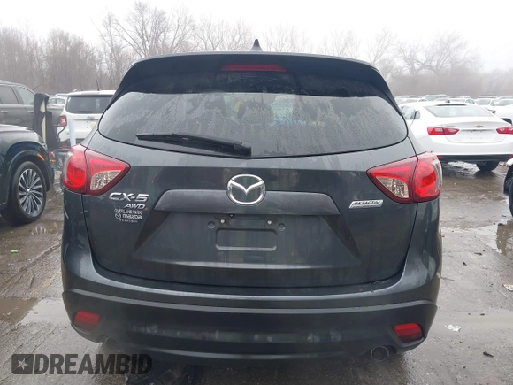 2014 Mazda CX-5 Grand Touring with VIN JM3KE4DY0E0392476, listed as a IAAI auction lot 41419144 with 89,245 mi miles and . Bid and sale history available at carsss.com. Image 16.