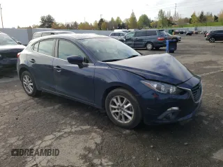 2015 Mazda 3 i Touring with VIN 3MZBM1L78FM235597, listed as a Copart auction lot 51717005 with 57,186 mi miles and Salvage title. Bid and sale history available at DreamBid. Image 4.